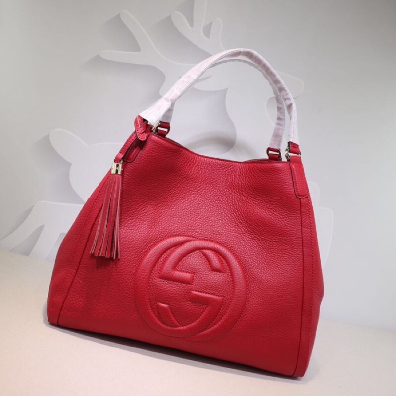 G*u*i shopping bags